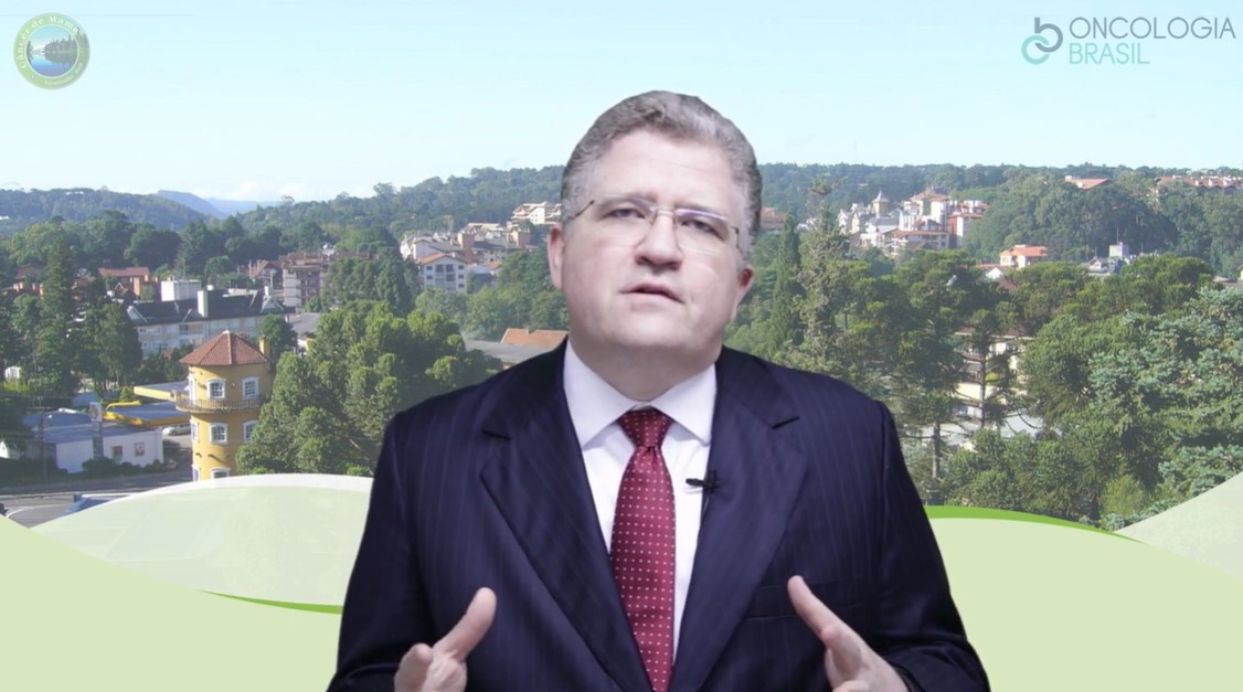 Dr. Felipe Andrade explicando sobre abordagens para tratar axila positiva.